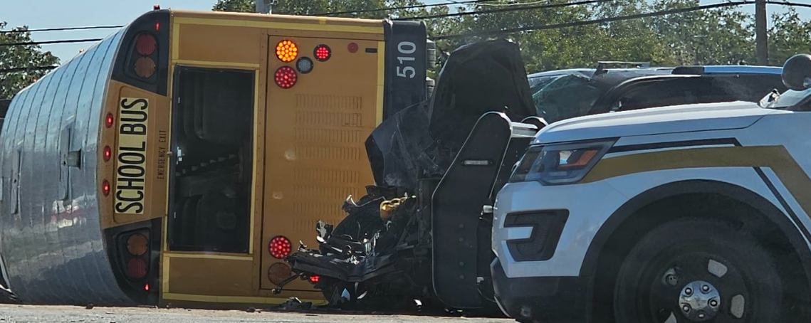 Car collides with school bus in Burleson; bus overturns | DFW Scanner